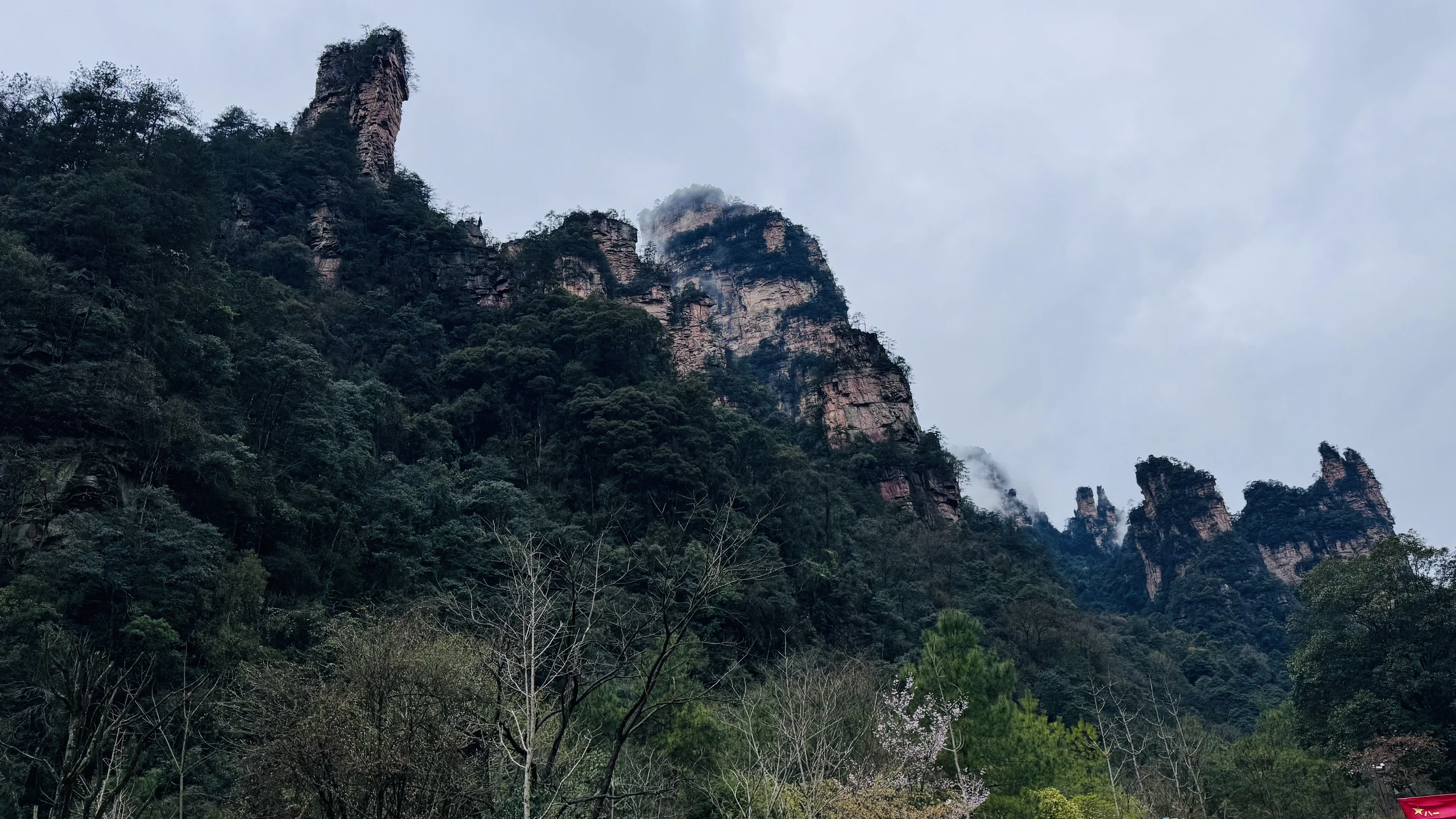 Mountain pillars rising through mist in Zhangjiajie, China